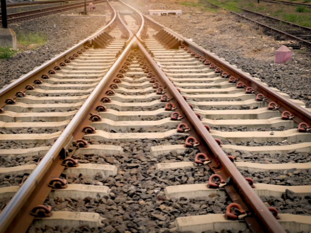 Two railroad tracks converging