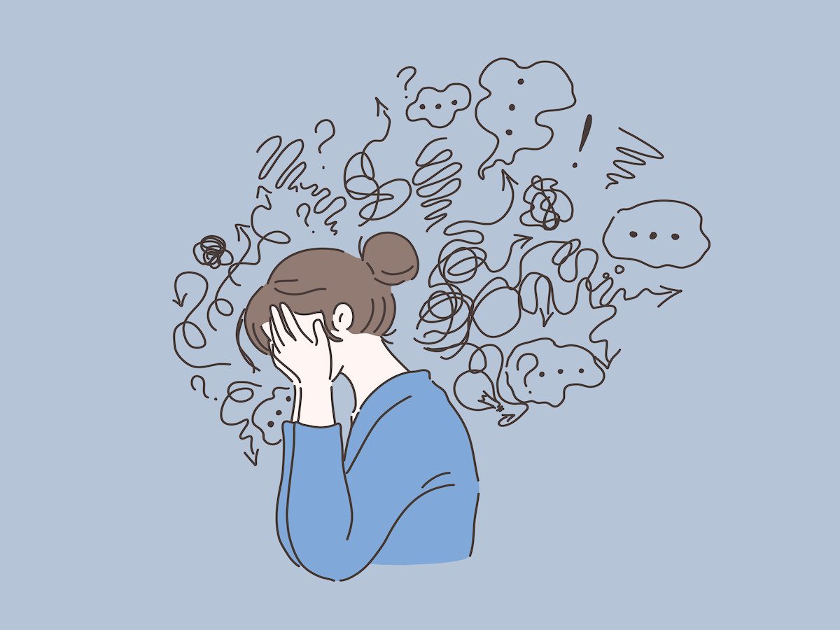 A person closing face with palms in despair
