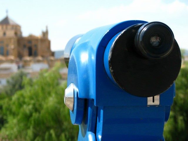 blue telescope-like device outside