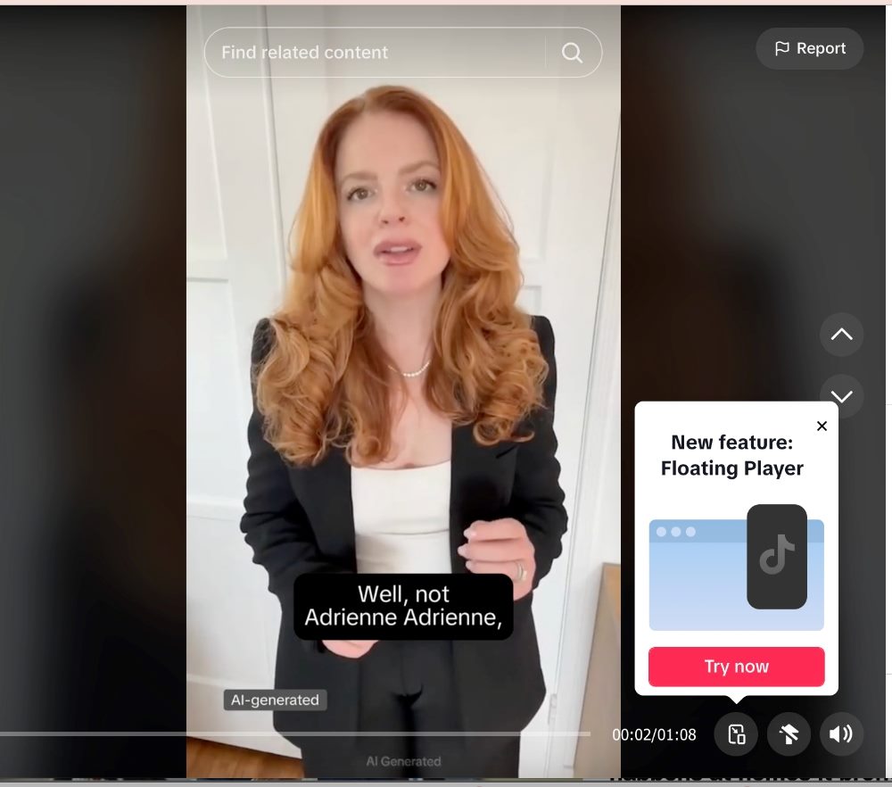 An AI-generated TikTok Symphony Digital Avatar is shown in a video. The avatar, resembling a young woman with long, curly red hair, is dressed in a black blazer over a white top. She is speaking and gesturing, with the caption, "Well, not Adrienne Adrienne," displayed at the bottom of the screen. A floating player feature prompt is visible, indicating a new TikTok feature. The video is 2 minutes and 8 seconds long, with controls for reporting, sharing, and other options.