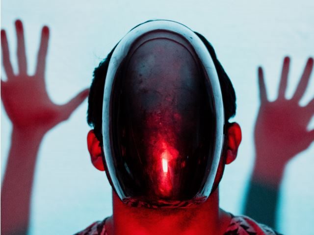 A man with a metal face - augmented artificial intelligence concept