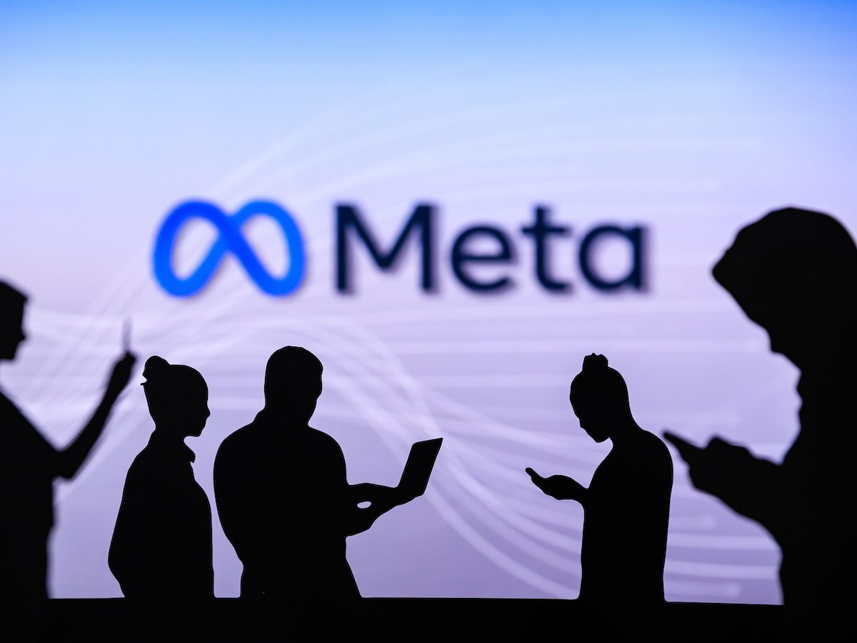 Meta logo with figures in front