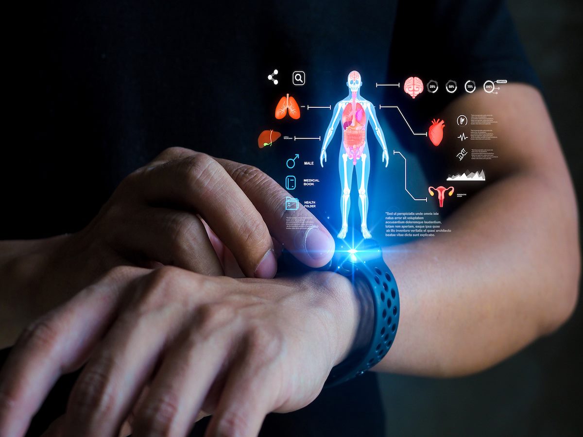 A smartwatch projects a holographic health dashboard