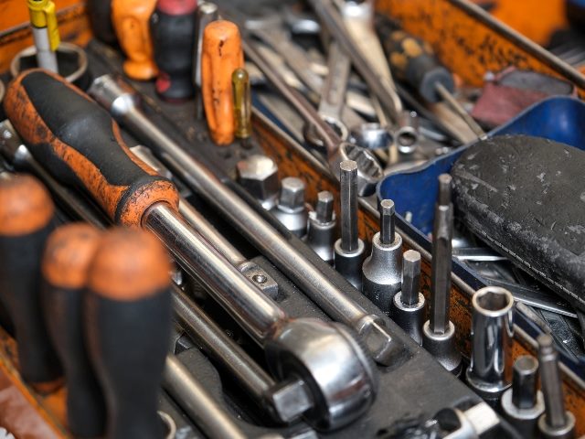 Toolset with ring spanners, screwdrivers, wrenches, bit socket set.