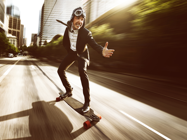 A marketing strategist using a long skateboard to get to work - marketing personalization concept
