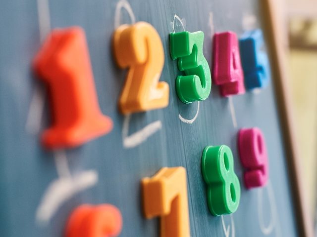 Learning, colored numbers on a blackboard.