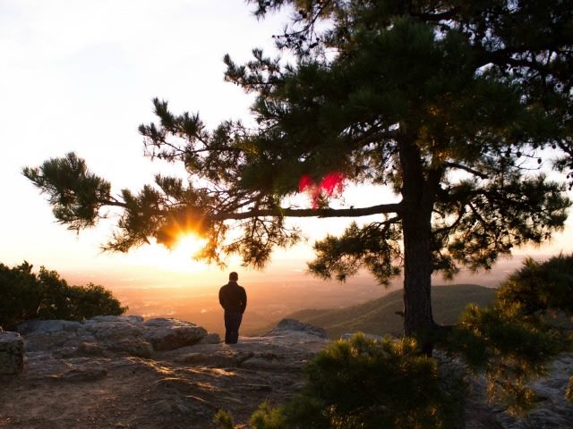man on a bright edge