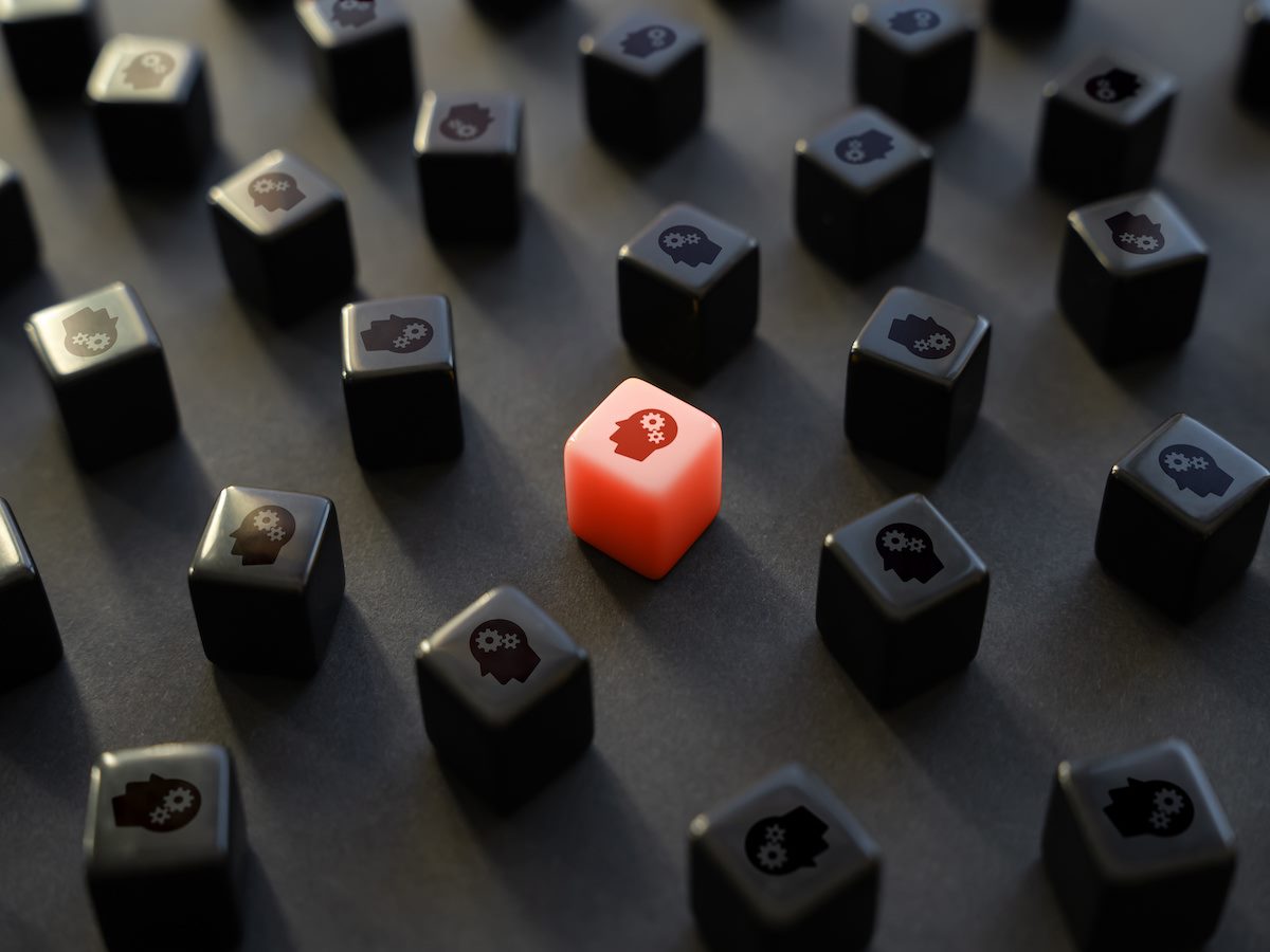 Red and black dice with head and gears icons 