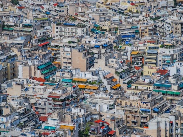 Urban sprawl in Athens, Greece, with colorful buildings piled close together, symbolizing martech sprawl. 