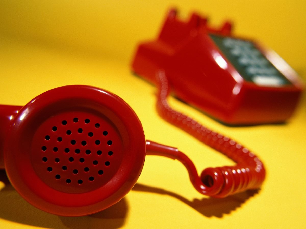 A phone lying off the hook