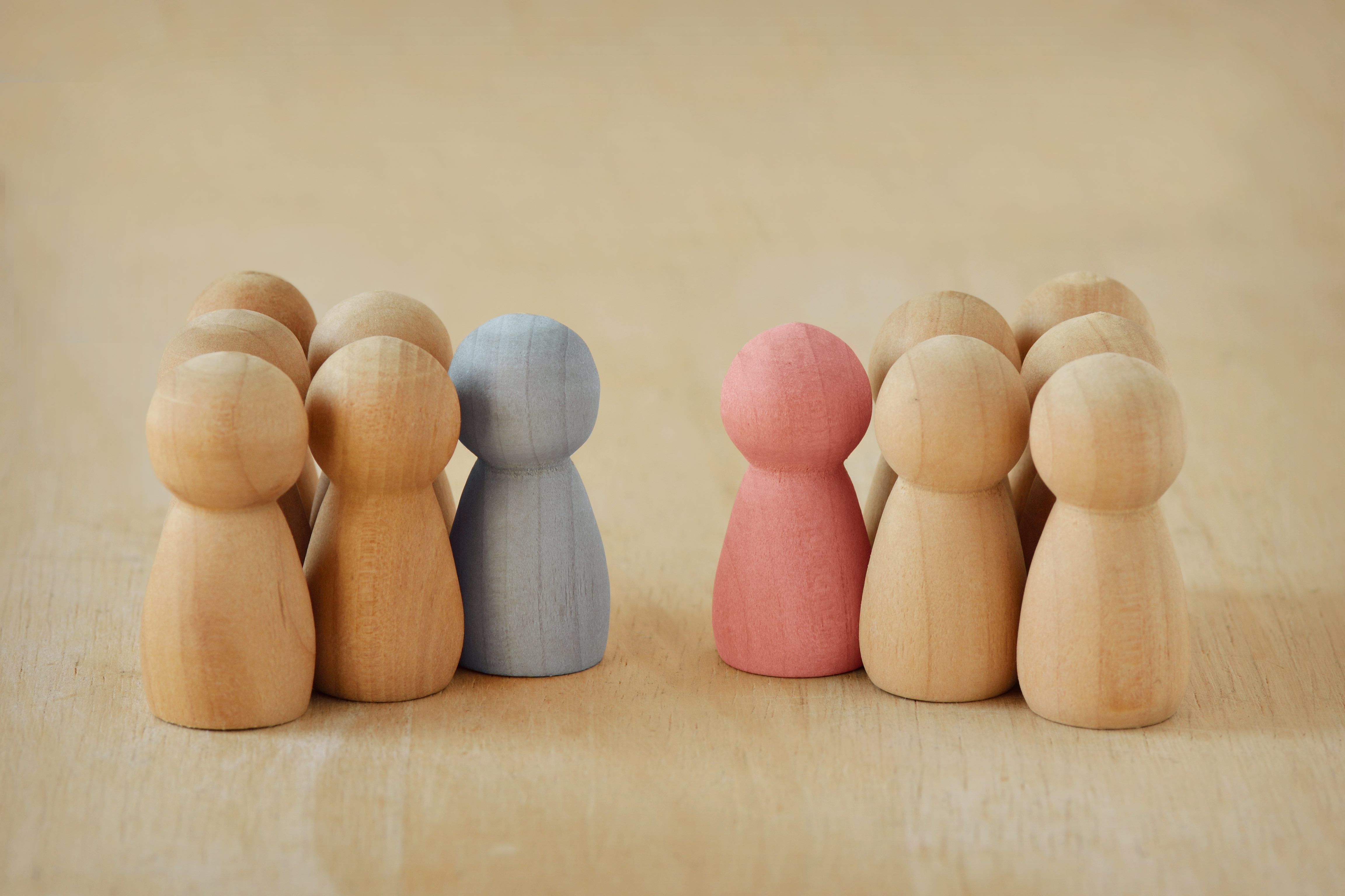 Two groups of wooden pawns