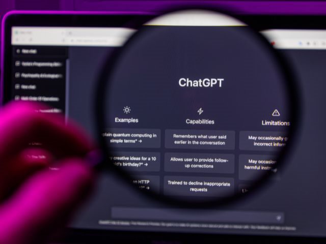 Someone holding a magnifying glass over large language model ChatGPT