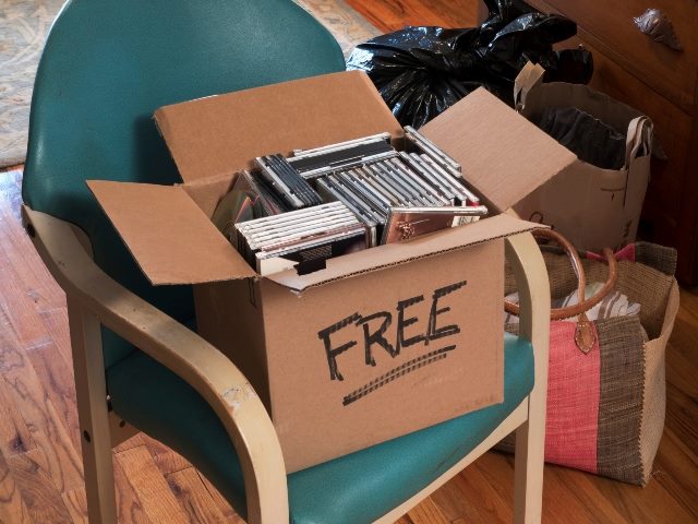 A box of free CDs and DVDs