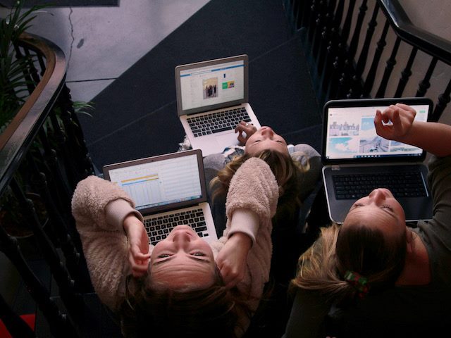 employees looking up above them