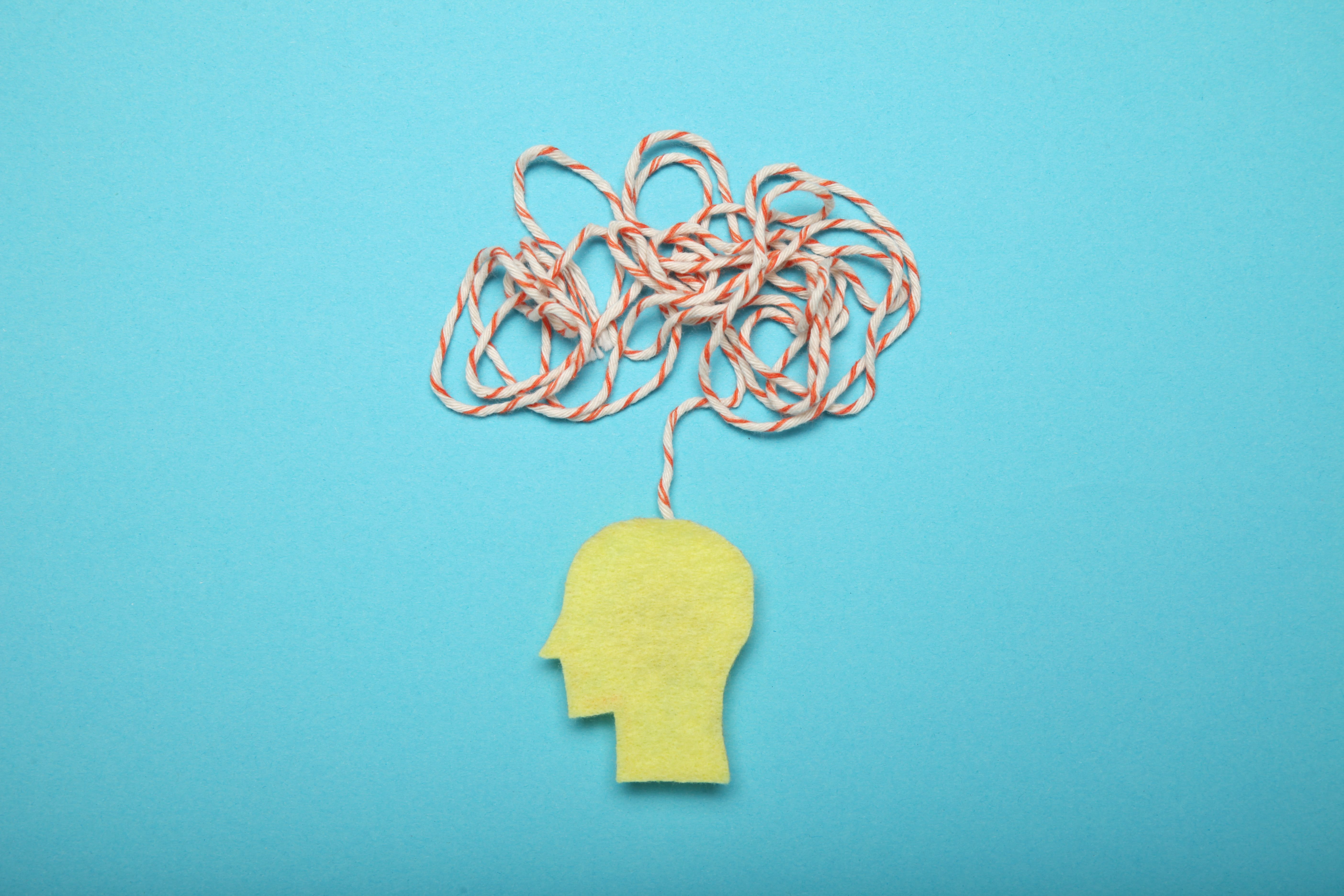 Felt head cutout with string coming out on top 