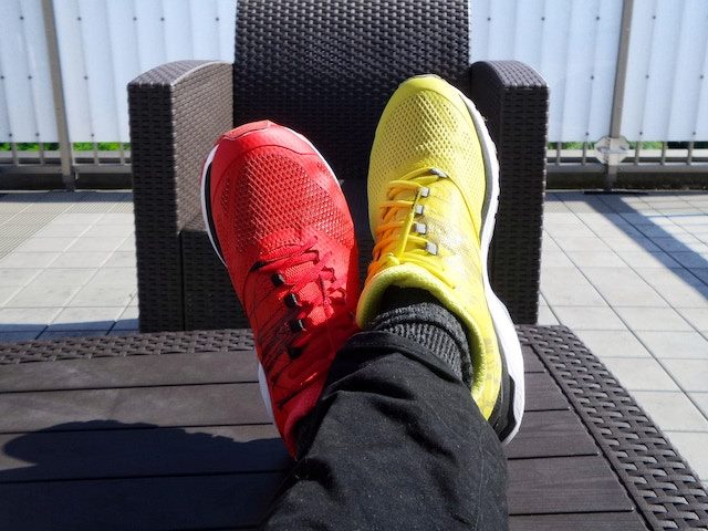 Pair of sneakers in different colors