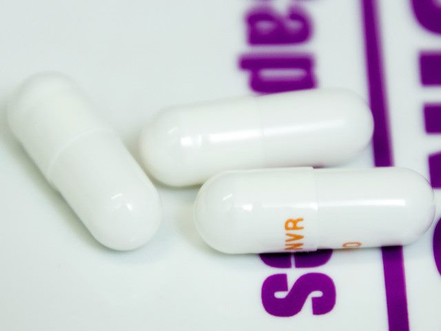 Three capsules of medicine.