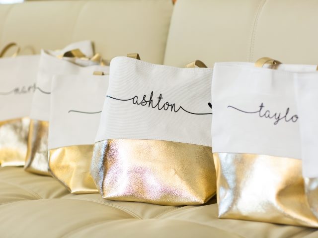 Gold gift bags with names on them.