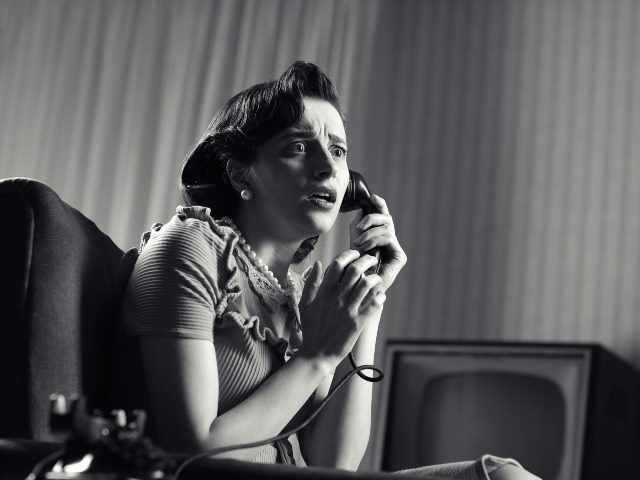 Woman on rotary phone