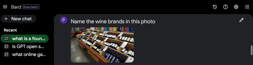 Google Bard image query with image of wine bottles in store.
