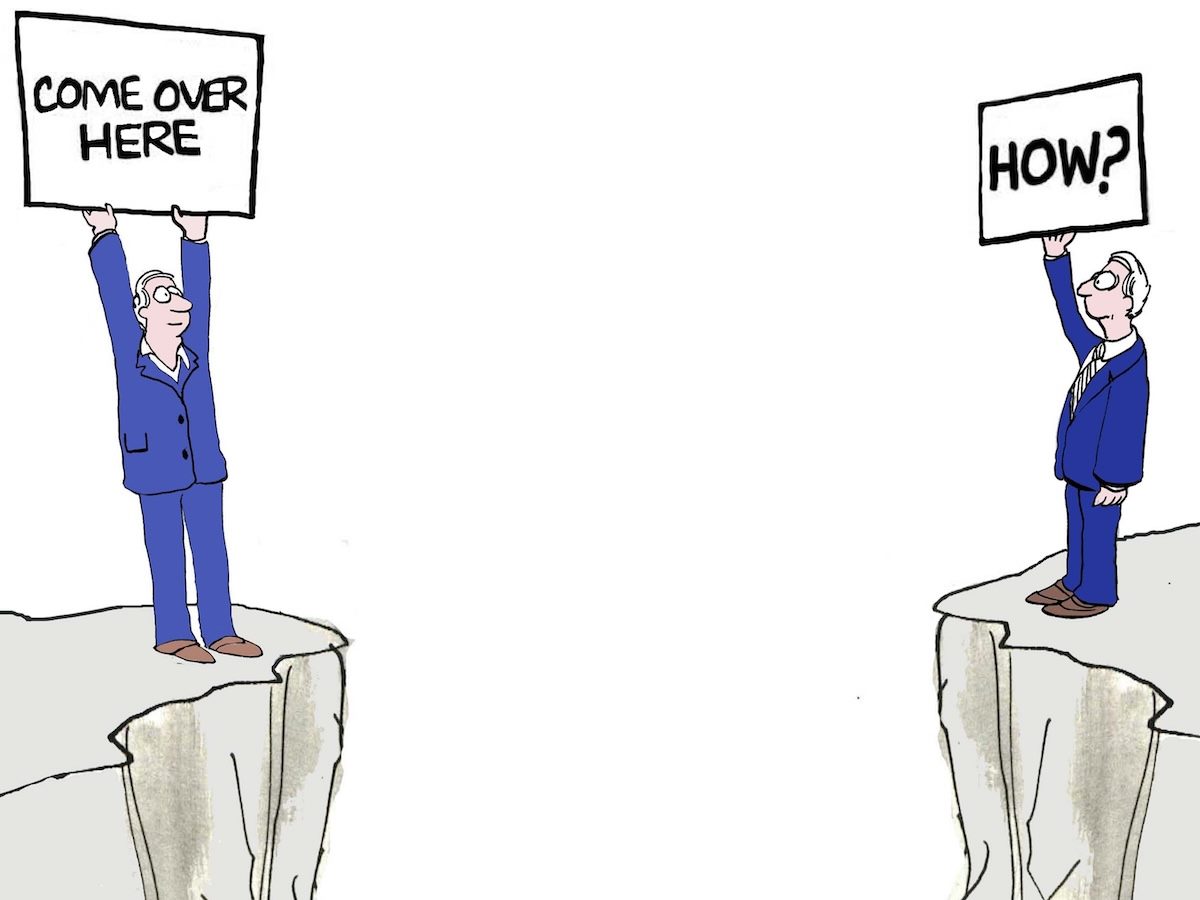 Two men on either side of a divide. Each holds a sign, one saying "Come over here" and the other saying "how?"