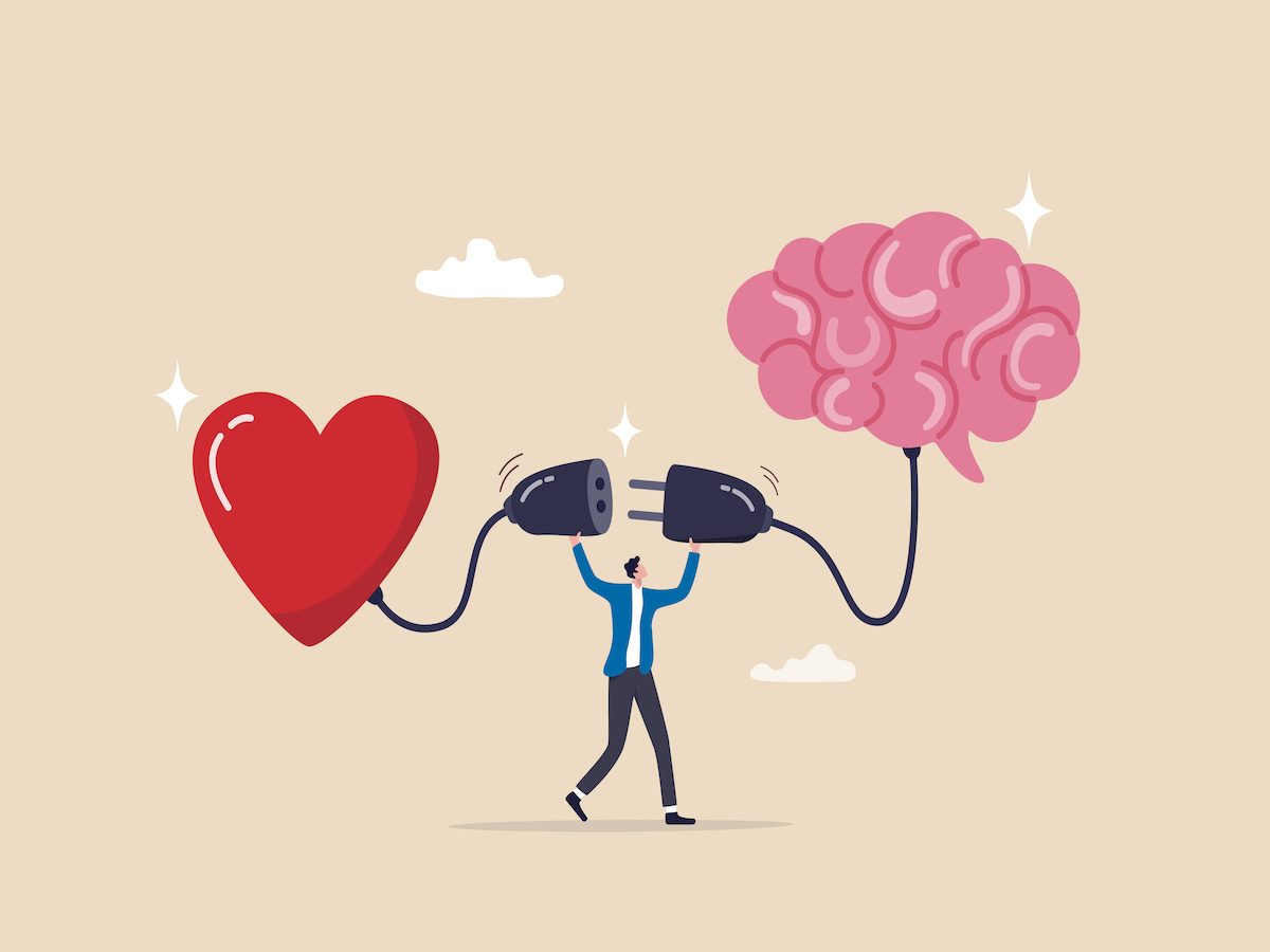 An illustration of a person plugging a heart into a brain