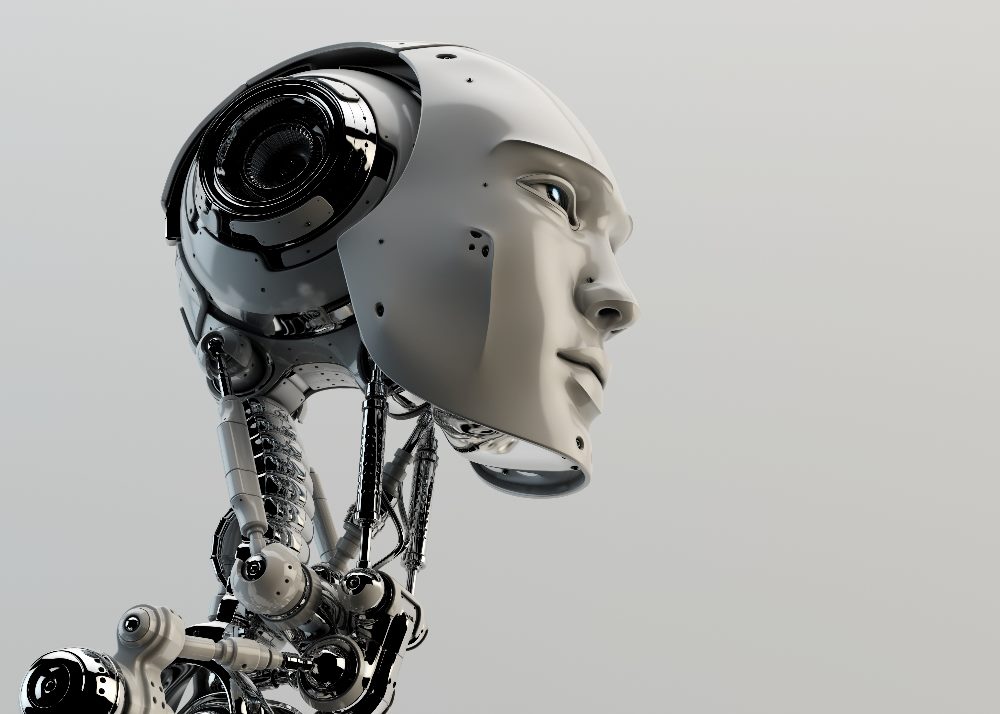 A cyborg head and neck with visible vertebra and glowing blue eyes representing the development of artificial general intelligence or AGI.