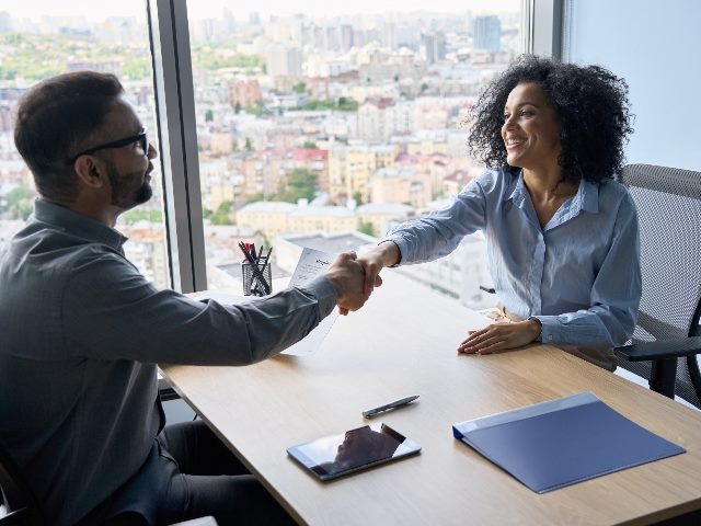 Business hiring meeting with woman and man 