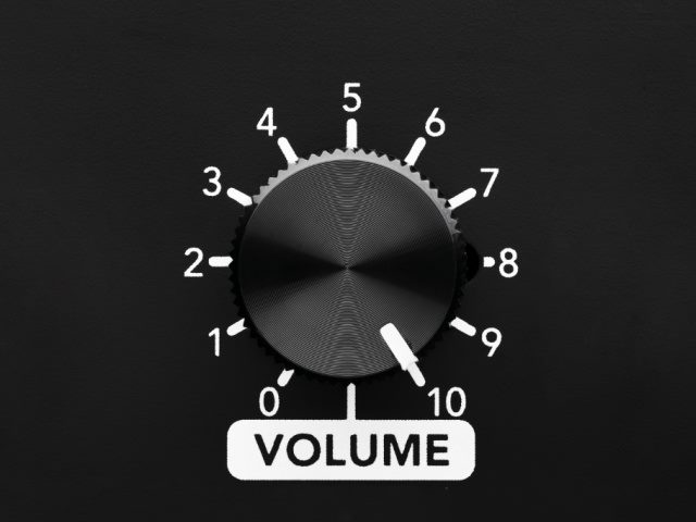 black volume dial showing volume turned up to 10