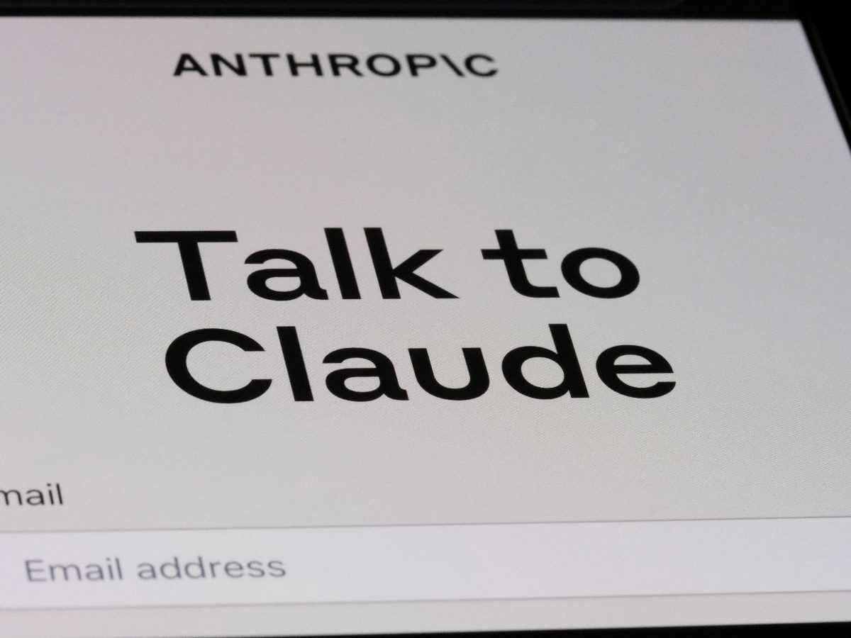 Phone screen that says "Anthropic Talk to Claude"