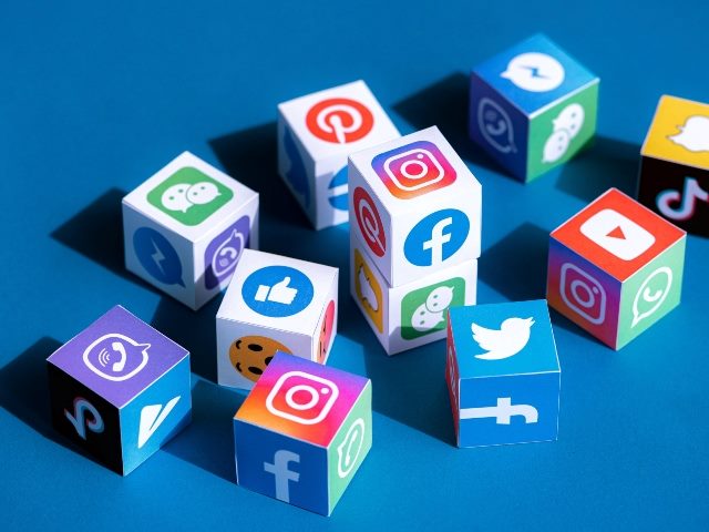 Paper cubes collection with printed logos of world-famous social  media networks and online messengers, such as Facebook, Instagram, YouTube, Telegram, Pinterest and others
