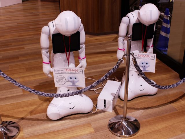 pair of robots appearing to be asleep
