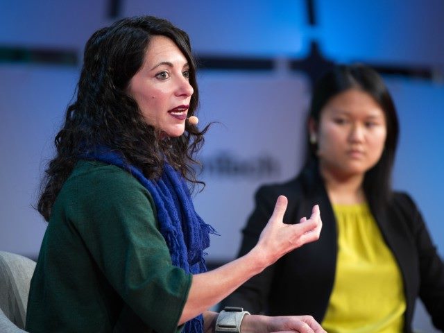 Tracy Frey of Google (left) on stage at EmTech at MIT in Cambridge, Mass. alongside Karen Hao of MIT Technology Review.