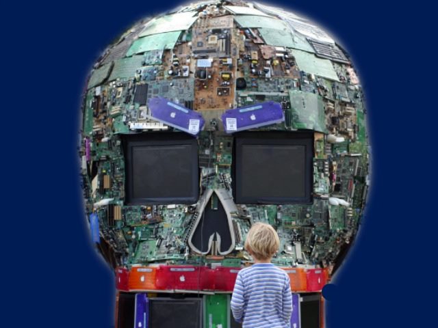 boy with a head-shaped machine