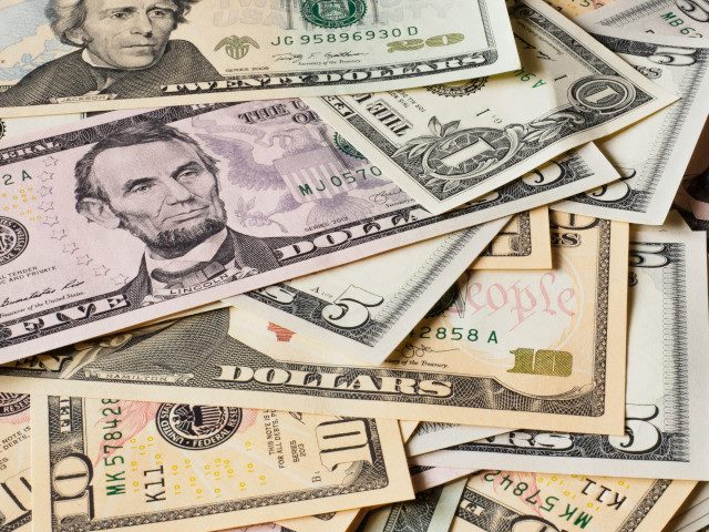 A pile of US cash bills.