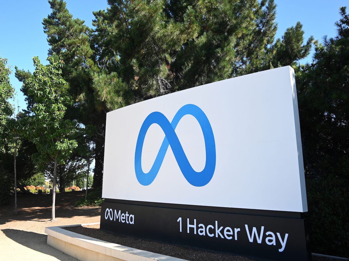 Meta logo sign near Meta Platforms headquarters on 1 Hacker Way.