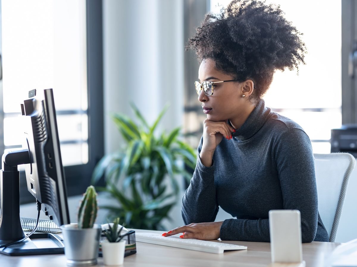 woman studying her screen