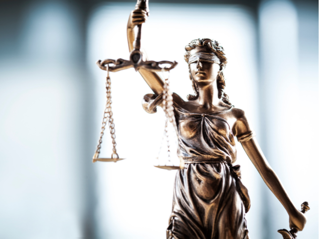 The statue of justice holding scales 