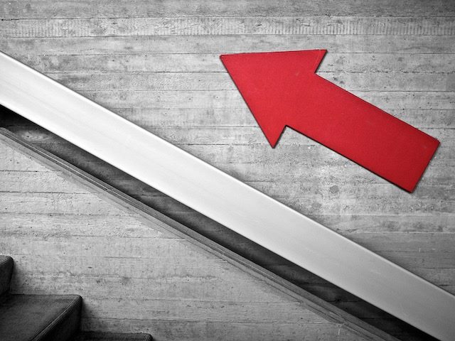 red arrow pointing up