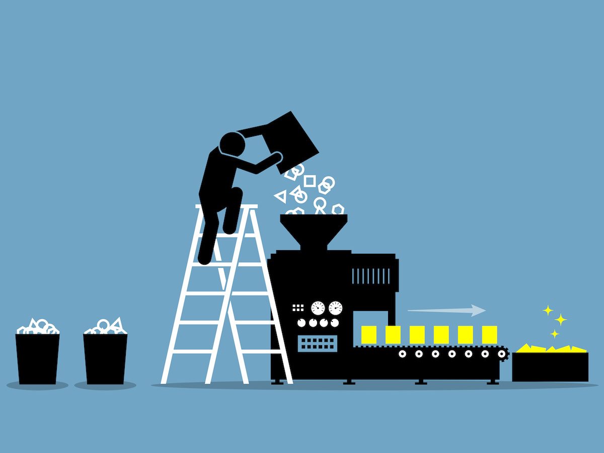 Person pouring and loading raw data into a machine and convert the data into useful and valuable information