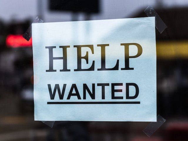 Help wanted sign in a window