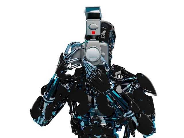 A black shiny robot aims a camera as if at a photo shoot. 