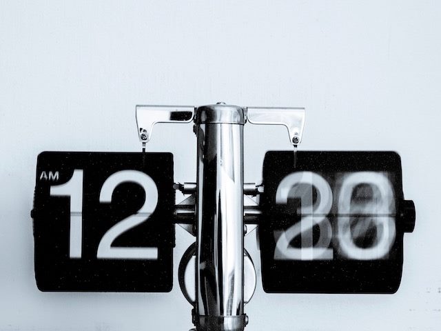 quickly moving dials of a clock