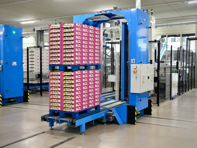 A stack of boxes at an apple processing plant.