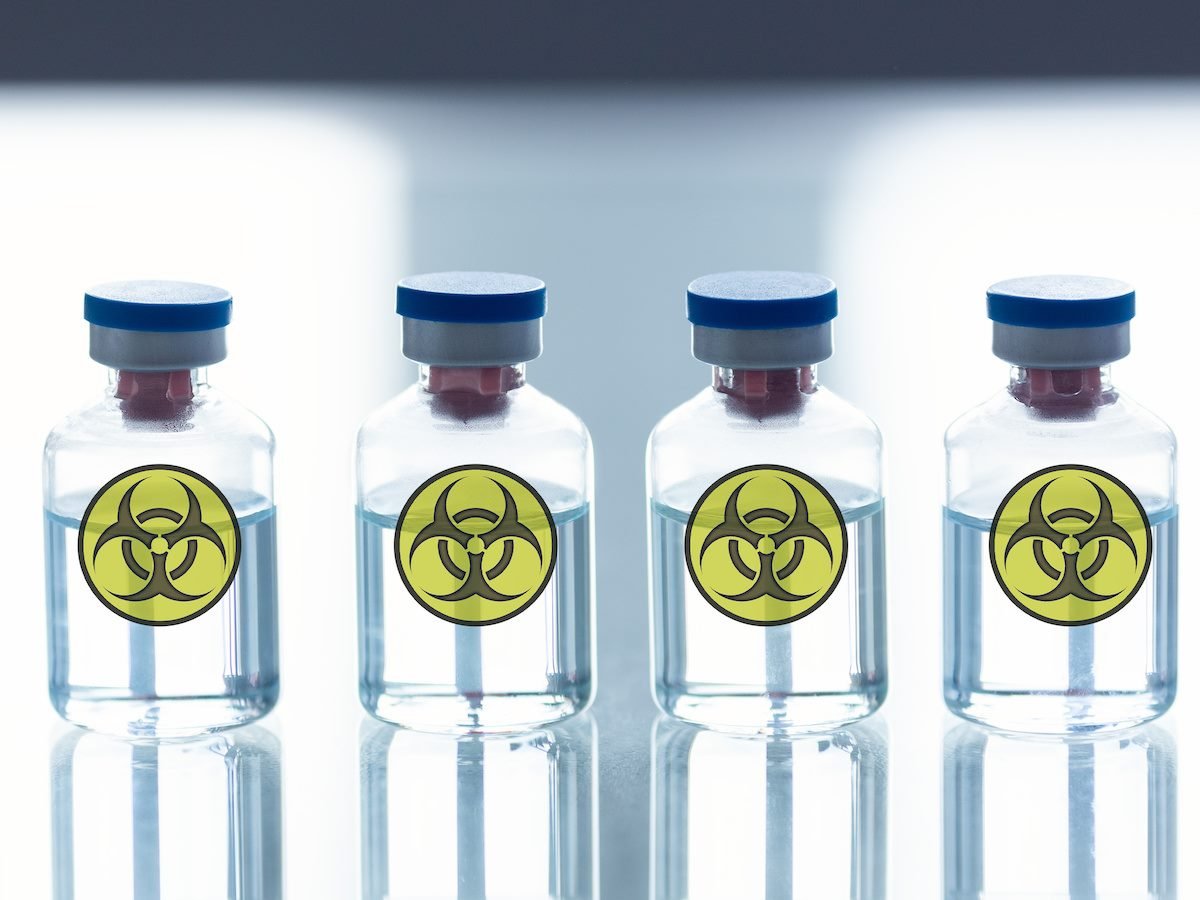 A row of ampoules with a bio-hazard sign