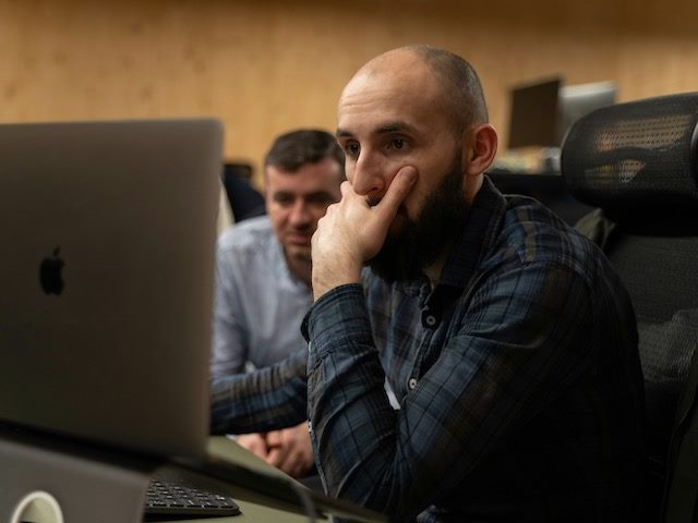 Man looking at computer with frustration