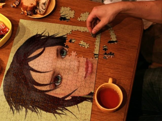 jigsaw puzzle of a face