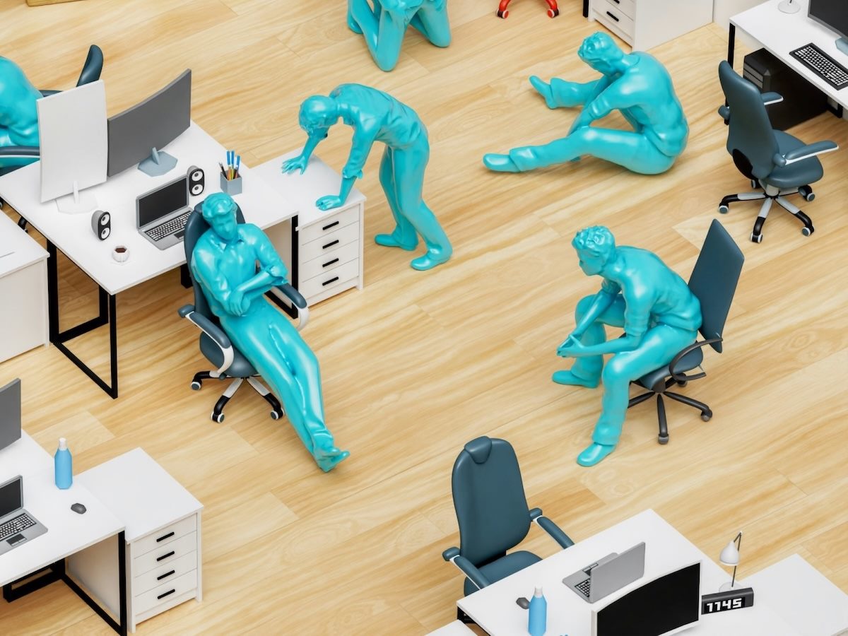 a model of an office space with fake plastic green figurines of workers, in varying states of despair