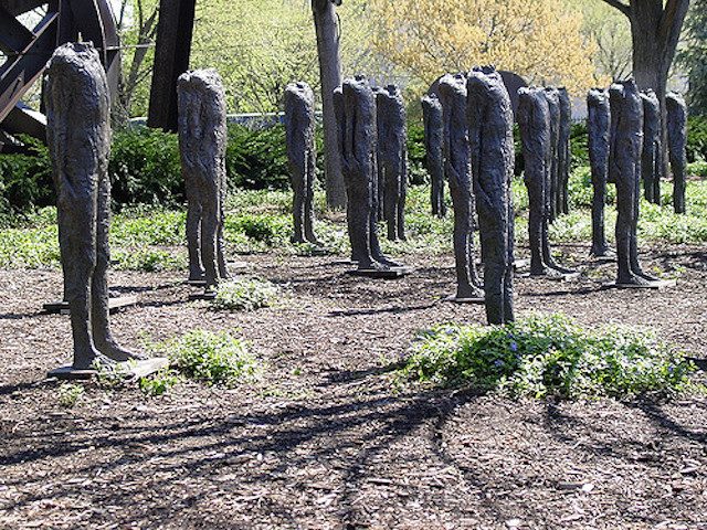 a series of statues without heads