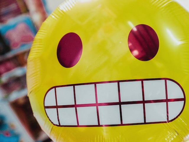 grimace emoji balloon